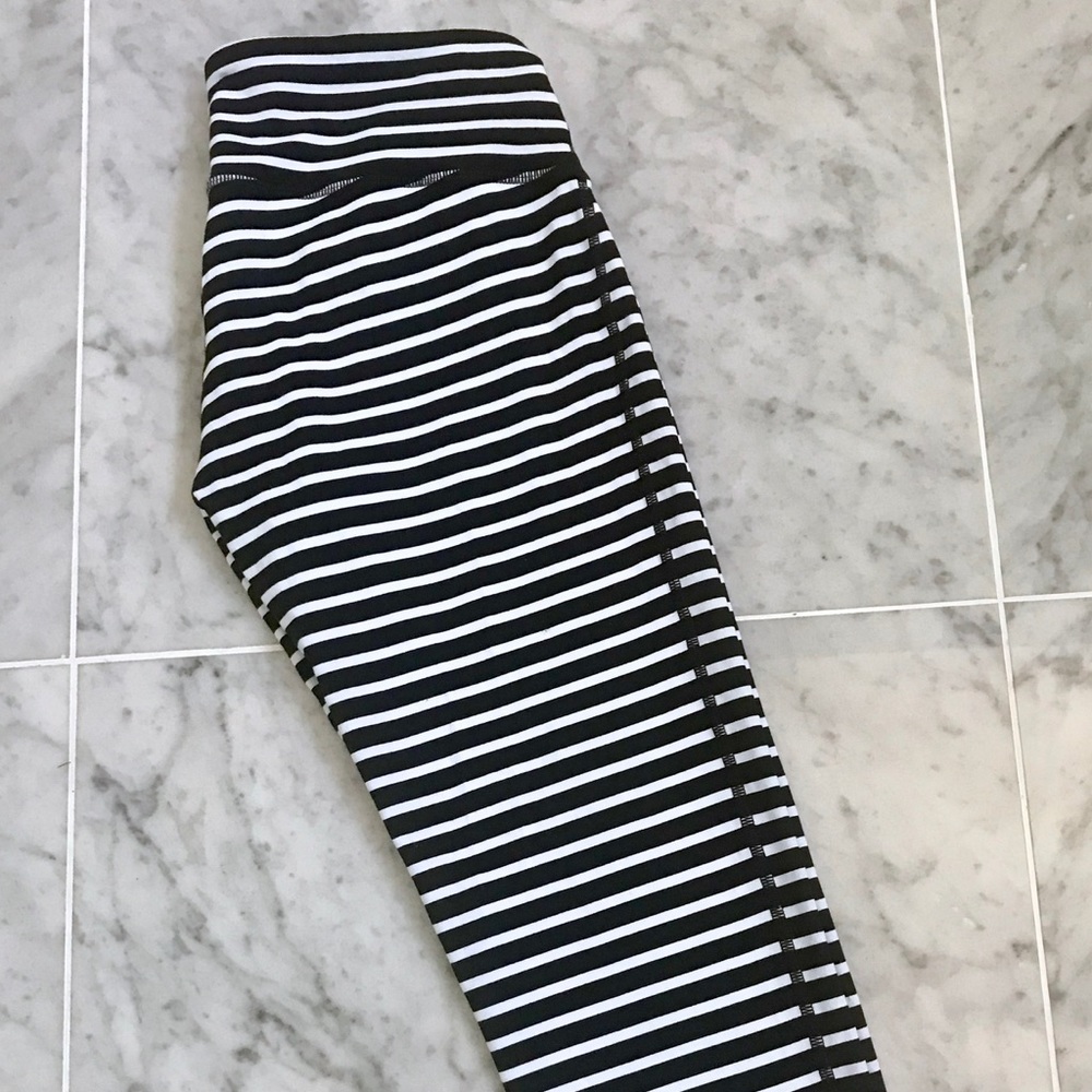 Athleta black and white striped Chaturanga tights